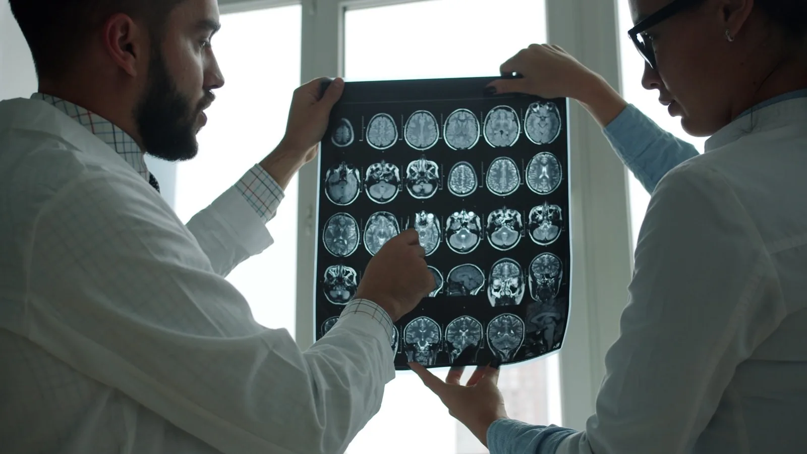A clinician working at a desk